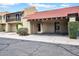 Inviting townhome exterior with covered parking and well-maintained desert landscaping at 10235 N 31St St # 15, Phoenix, AZ 85028