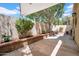 Relaxing patio area featuring a shade awning, raised planters and privacy walls at 10235 N 31St St # 15, Phoenix, AZ 85028