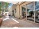 Covered patio with large sliding doors and beautiful landscaping at 10235 N 31St St # 15, Phoenix, AZ 85028
