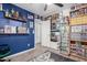 Another secondary bedroom with personal decorations and wood look flooring at 1130 W Kingbird Dr, Chandler, AZ 85286