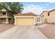 Charming single-story home with a two-car garage and well-maintained landscaping at 1130 W Kingbird Dr, Chandler, AZ 85286