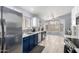 Modern kitchen with stainless steel appliances, stylish backsplash, and ample counter space at 1130 W Kingbird Dr, Chandler, AZ 85286