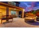 Outdoor patio with built-in grill, fire pit, seating area, providing an ideal space for entertaining and relaxation at 11844 W Nadine Way, Peoria, AZ 85383