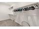 Spacious walk-in closet with ample shelving and hanging space for organization and storage at 11844 W Nadine Way, Peoria, AZ 85383