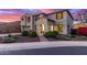 Beautiful two-story home featuring an arched entryway, desert landscaping and a two car garage at 11844 W Nadine Way, Peoria, AZ 85383