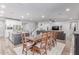 Inviting open concept features dining area transitioning into a living room for seamless entertaining at 11844 W Nadine Way, Peoria, AZ 85383