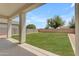 Spacious backyard featuring a large grass area, perfect for outdoor activities at 1237 W Agrarian Hills Dr, San Tan Valley, AZ 85143