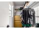 Bright walk-in closet with natural light, wooden drawers, shelving and hanging storage at 125 S 56Th St # 36, Mesa, AZ 85206