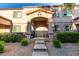 Charming condo with a cozy front porch and well-maintained desert landscaping at 125 S 56Th St # 36, Mesa, AZ 85206