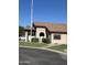 Charming recreation center features a tile roof, lush landscaping, and inviting entrance for community enjoyment at 125 S 56Th St # 36, Mesa, AZ 85206