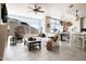 Bright living room featuring a fireplace, ceiling fan, stylish furniture and large windows with mountain views at 140 E Rio Salado Pkwy # 512, Tempe, AZ 85281