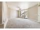 Bright, airy living room with neutral tones, carpeting, ceiling fan, and balcony access at 140 E Rio Salado Pkwy # 512, Tempe, AZ 85281