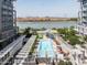 Incredible exterior view of a pool area and condos next to Tempe Town Lake at 140 E Rio Salado Pkwy # 512, Tempe, AZ 85281
