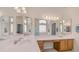 Bathroom with dual sinks, large mirrors, and a vanity area at 14033 S 31St St, Phoenix, AZ 85048