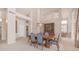 Spacious dining room with a large table, stylish chairs, and elegant lighting at 14033 S 31St St, Phoenix, AZ 85048