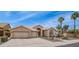 Beautiful single-story home with tile roofing, a two-car garage, and desert-style landscaping at 14033 S 31St St, Phoenix, AZ 85048