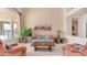 Bright living room featuring a large window, comfortable seating, and neutral decor at 14033 S 31St St, Phoenix, AZ 85048