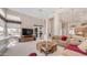 Bright living area offers an open layout, neutral tones, sliding glass door access, and ample natural light at 14033 S 31St St, Phoenix, AZ 85048