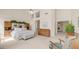 Large main bedroom with high ceilings, built-ins, and comfortable rocking chair at 14033 S 31St St, Phoenix, AZ 85048