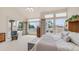 Spacious main bedroom with a seating area, backyard view, and large bed at 14033 S 31St St, Phoenix, AZ 85048