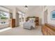 Bright main bedroom with vaulted ceilings, built-ins, and neutral carpet at 14033 S 31St St, Phoenix, AZ 85048