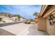 Neighborhood street with well-maintained homes, lush landscaping, and mountain views in the distance at 14033 S 31St St, Phoenix, AZ 85048