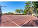 Outdoor basketball court featuring well-maintained surfaces and a play structure for the whole Gathering at 150 N Nielson St, Gilbert, AZ 85234