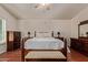 Cozy bedroom featuring wood floors, and furniture at 150 N Nielson St, Gilbert, AZ 85234