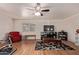Spacious bonus room featuring hardwood floors, a ceiling fan, and a comfortable seating area at 150 N Nielson St, Gilbert, AZ 85234