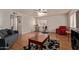 Multi-functional bonus room with hardwood floors, a ceiling fan, and ample space at 150 N Nielson St, Gilbert, AZ 85234