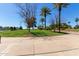 Scenic park area with lush green grass, mature trees, and well maintained landscaping at 150 N Nielson St, Gilbert, AZ 85234