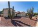 Well-landscaped front yard showcasing desert plants, adding to the property's curb appeal at 150 N Nielson St, Gilbert, AZ 85234