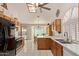 Bright kitchen featuring stainless steel appliances, white countertops, and a dining area at 150 N Nielson St, Gilbert, AZ 85234