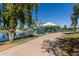 Carousel and Ferris wheel create Gathering fun along a beautiful Gilbert walking trail by the pond at 150 N Nielson St, Gilbert, AZ 85234