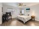 Well-lit bedroom featuring a ceiling fan, modern decor, and ample natural light at 15550 N Frank Lloyd Wright Blvd # 1101, Scottsdale, AZ 85260