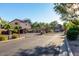 Gated community entrance with lush landscaping offers security and curb appeal at 15550 N Frank Lloyd Wright Blvd # 1101, Scottsdale, AZ 85260