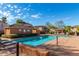 Community pool with lounge chairs, gazebo, and well-maintained landscaping for residents at 15550 N Frank Lloyd Wright Blvd # 1101, Scottsdale, AZ 85260