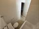 Bathroom featuring tile flooring, a toilet, and a shower/tub combo with white tile surround at 16602 N 25Th St # 217, Phoenix, AZ 85032