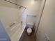 Full bathroom with tile tub-shower, tiled floor and modern fixtures offering a clean and functional space at 16602 N 25Th St # 217, Phoenix, AZ 85032