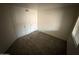 Clean, carpeted bedroom featuring ample closet space and a window at 16602 N 25Th St # 217, Phoenix, AZ 85032