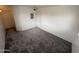 Comfortable bedroom featuring new carpeting, a closet, and neutral wall colors at 16602 N 25Th St # 217, Phoenix, AZ 85032
