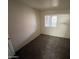 A cozy carpeted bedroom with a window providing natural light at 16602 N 25Th St # 217, Phoenix, AZ 85032