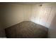 Spacious bedroom with neutral carpet and multiple closets offering ample storage space at 16602 N 25Th St # 217, Phoenix, AZ 85032