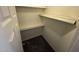 A closet with white walls and shelving, and neutral carpet for a clean and organized storage space at 16602 N 25Th St # 217, Phoenix, AZ 85032