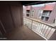 Balcony view of the building exterior and gravel common area at 16602 N 25Th St # 217, Phoenix, AZ 85032