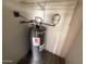 A water heater with exposed copper plumbing at 16602 N 25Th St # 217, Phoenix, AZ 85032