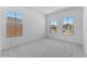 Bright bedroom with neutral walls, carpet and three large windows offering plenty of natural light at 18883 E Celtic Manor Dr, Queen Creek, AZ 85142