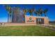 Community entrance sign with landscaping and clear blue skies, enhancing the welcoming atmosphere at 18883 E Celtic Manor Dr, Queen Creek, AZ 85142