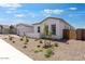 Charming single-Gathering home with a manicured front yard at 18883 E Celtic Manor Dr, Queen Creek, AZ 85142