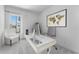 Modern office space with stylish desk, comfortable chair, and ample natural light at 18883 E Celtic Manor Dr, Queen Creek, AZ 85142